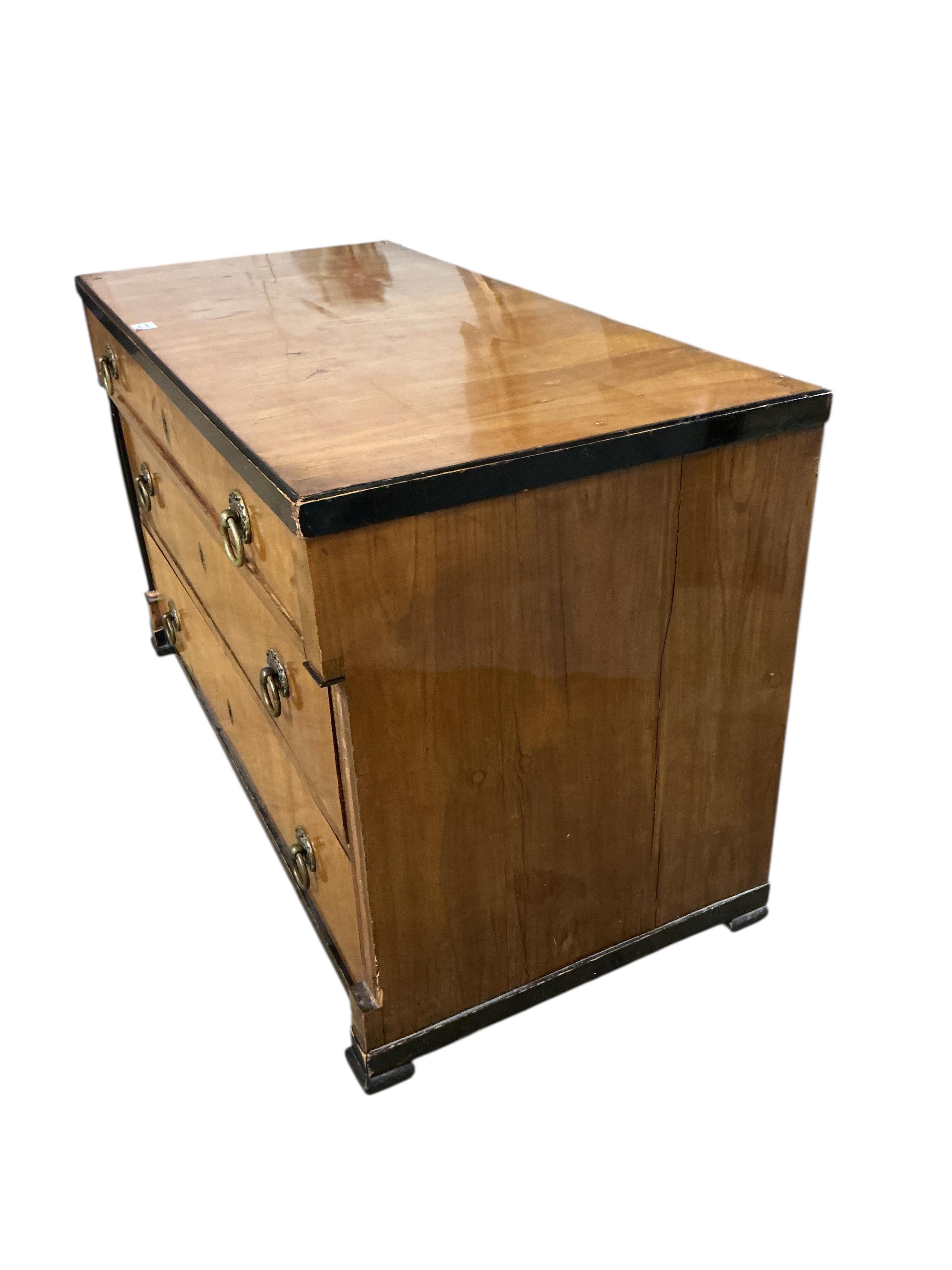 A 19th century Biedermeier style birch and ebonised commode, width 128cm, depth 62cm, height 78cm